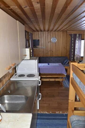 Фото номера Коттедж с 1 спальней и сауной Дома для отпуска Tiirantuvat г. Juankoski 31
